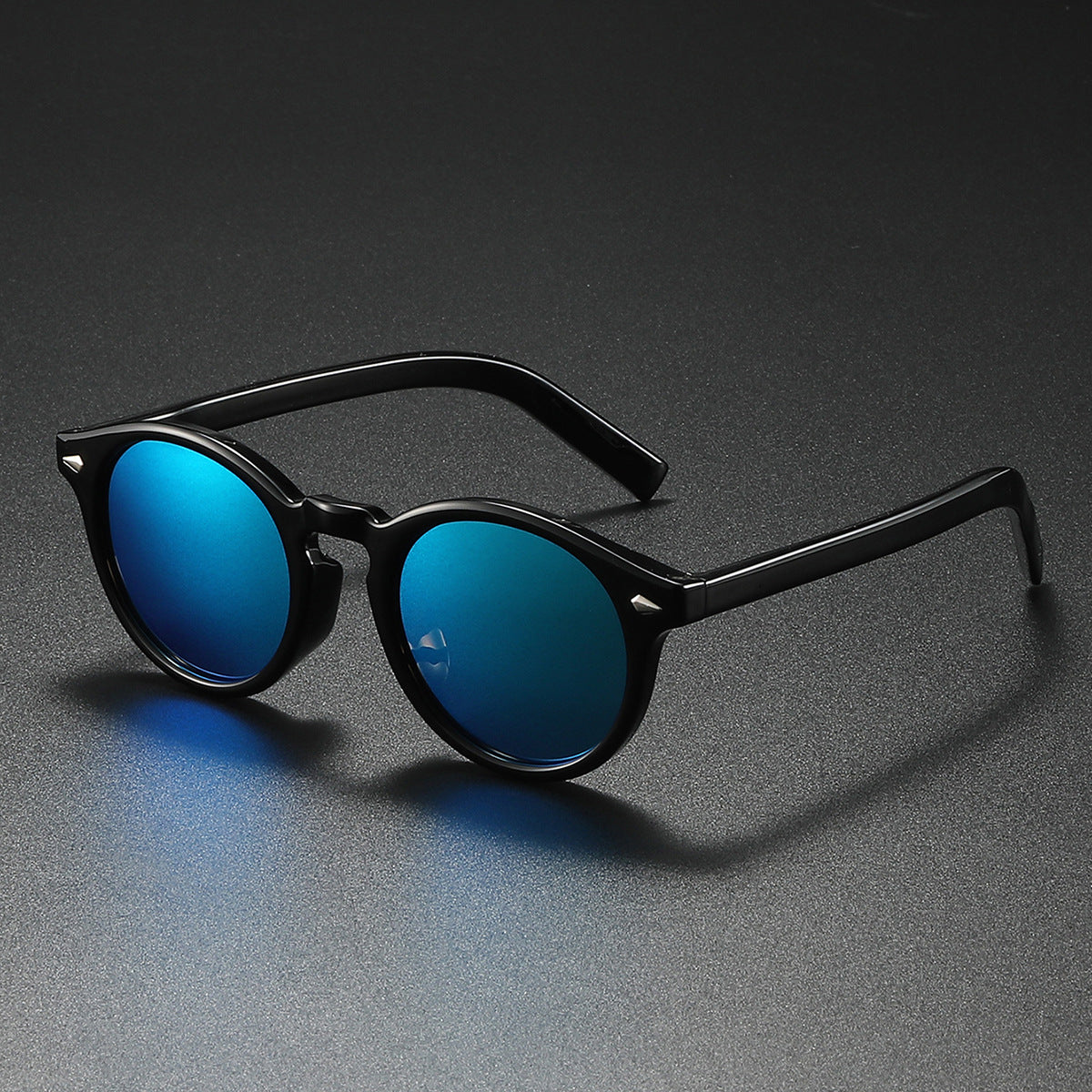 Damen Rund-Sonnenbrille mit transparentem Rahmen und reflektierenden Gläsern Karnz