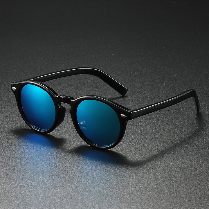 Damen Rund-Sonnenbrille mit transparentem Rahmen und reflektierenden Gläsern Karnz