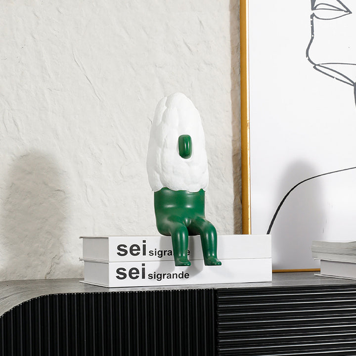 Dekorativer goldener und weißer Schaffigur