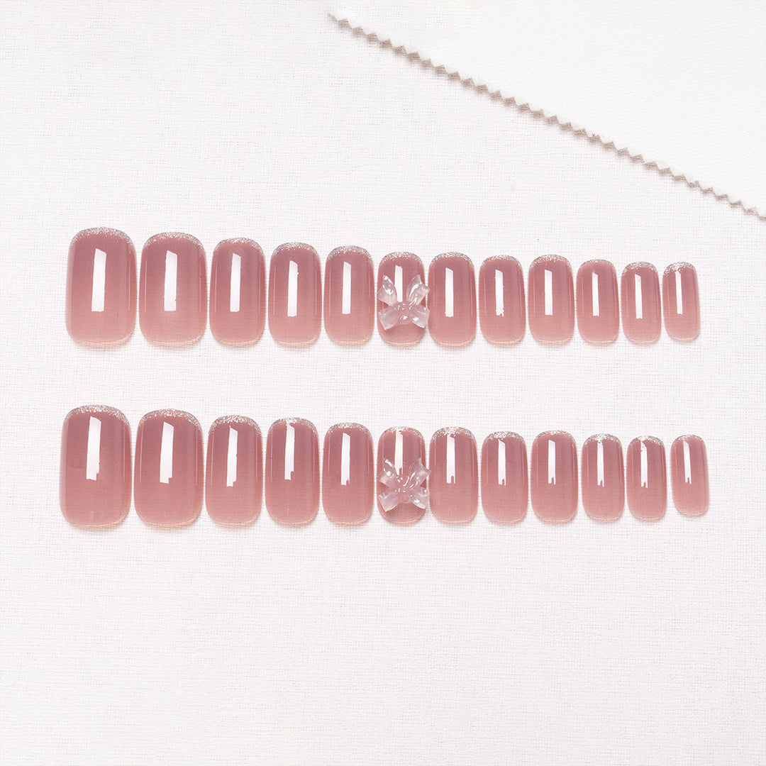 Elegantes Press-On-Nagelkunst-Set mit Schleifenakzenten