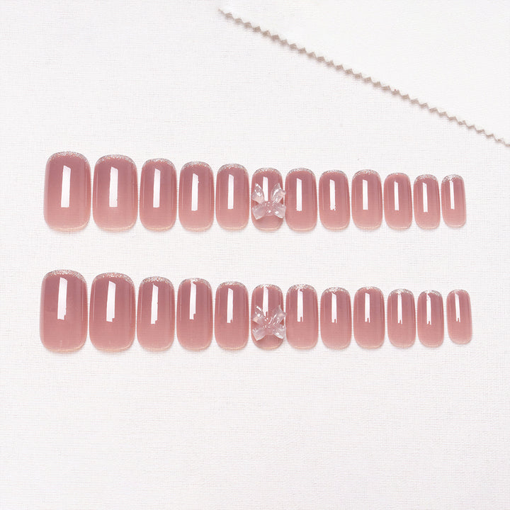 Elegantes Press-On-Nagelkunst-Set mit Schleifenakzenten