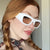 Damen extravagante Sonnenbrille mit strukturiertem Rahmen Karnz