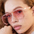 Damen modische Oversized-Sonnenbrille mit eleganter, facettierter Rahmenkonstruktion Karnz