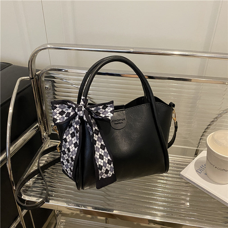 Elegante Schleifenakzent-Handtasche Karnz