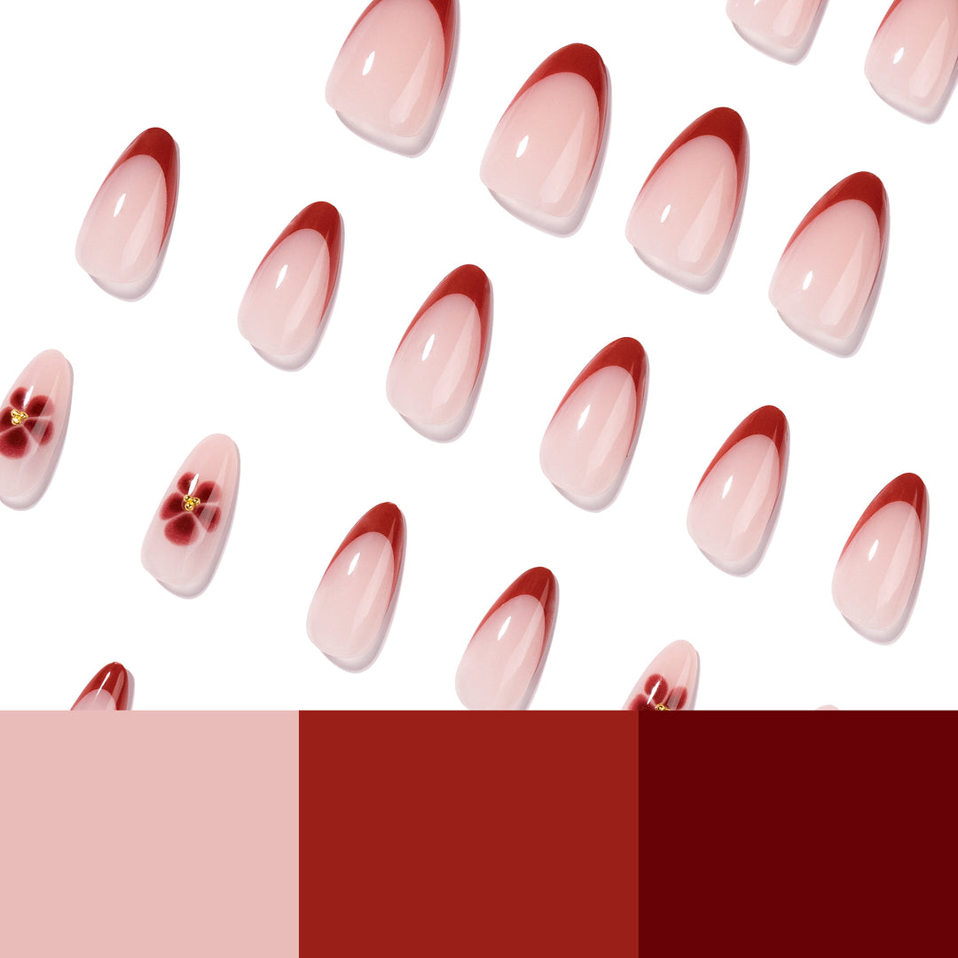 Elegante und kunstvoll gestaltete Stiletto-Nägel mit Blumendesign Karnz