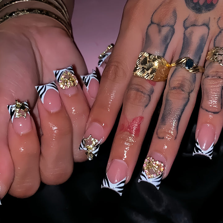 Dekorative Strass- und Zebra-Muster Druck-Nägel Karnz
