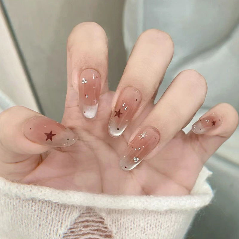 Elegante Druck-Nageltips mit goldenen Akzenten Karnz