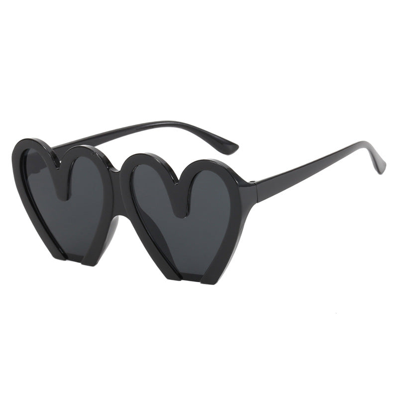 Damen Herzförmige Sonnenbrille mit robustem Kunststoffrahmen und UV-Schutz Karnz