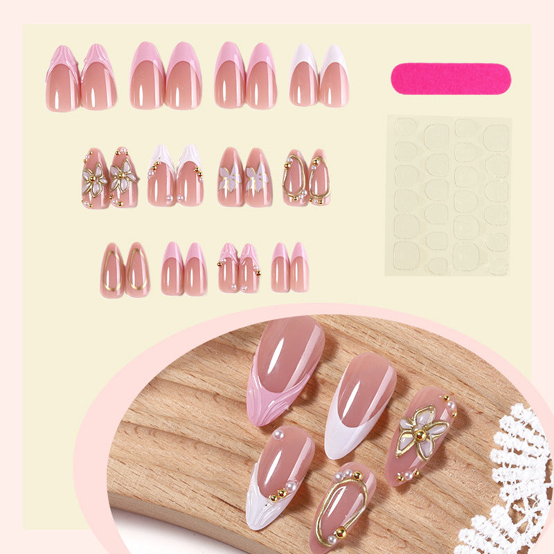Dekorativer Press-On Nagelset mit floralen Designs Karnz
