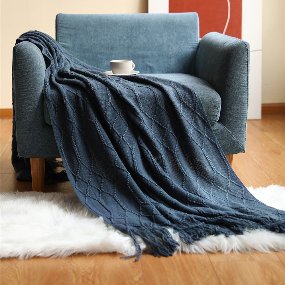 Gemütliche Strickwurfdecke