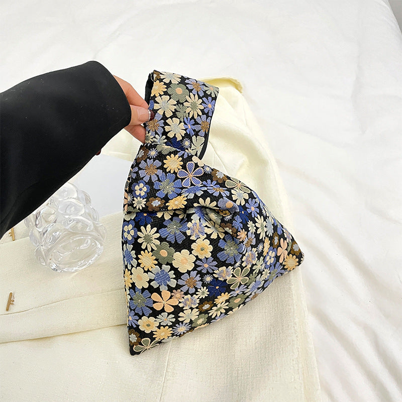 Stilvolle Blumenbedruckte Clutch
