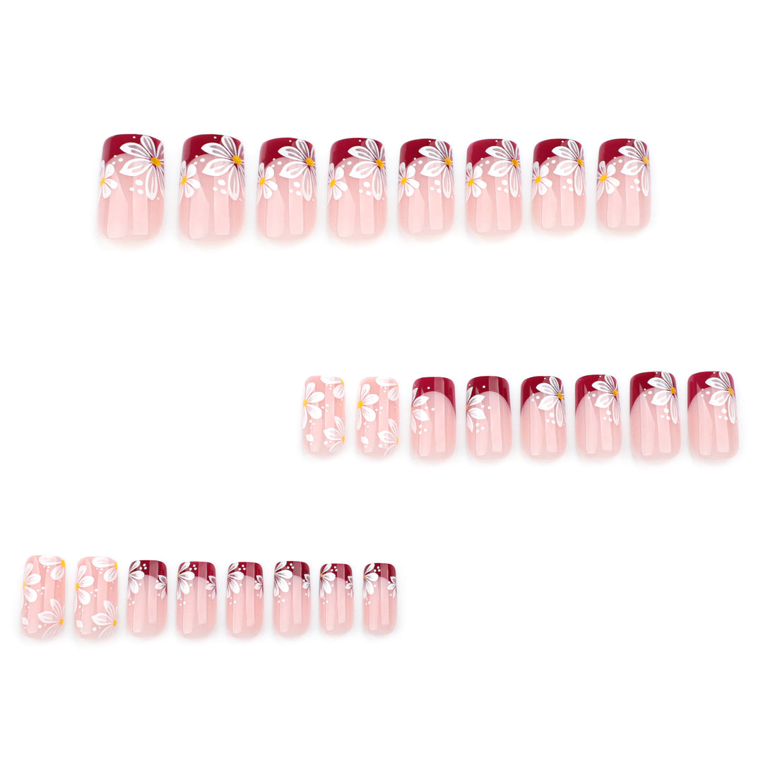 Kunstvolle Nagelverlängerungen mit Blumenmotiv Karnz