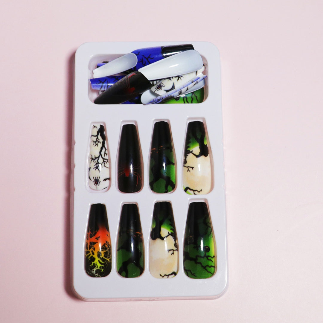 Künstlerisches Press-On Nageldesign mit Tropfeneffekt Karnz