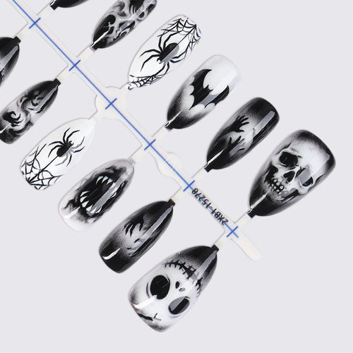 Kreatives Kunstnagelset mit gruseligen Motiven Karnz