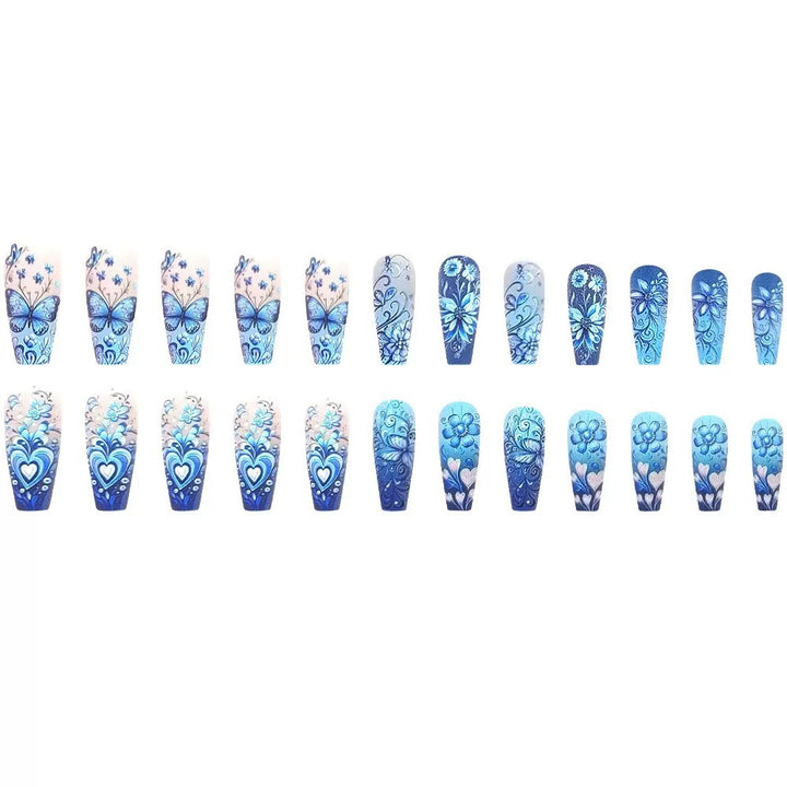 Kunstnagelset mit floralen und Schmetterlingsmuster Karnz