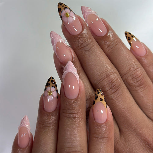 Kunstnagelset mit trendigen Leoparden-Design und eleganten Akzenten Karnz
