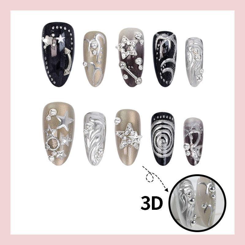 Kunstnageldesign Set mit glamourösen Sternen- und Metallic-Akzenten Karnz