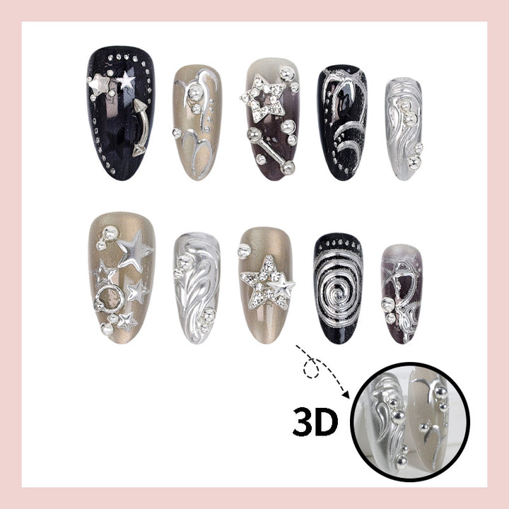 Kunstnageldesign Set mit glamourösen Sternen- und Metallic-Akzenten Karnz