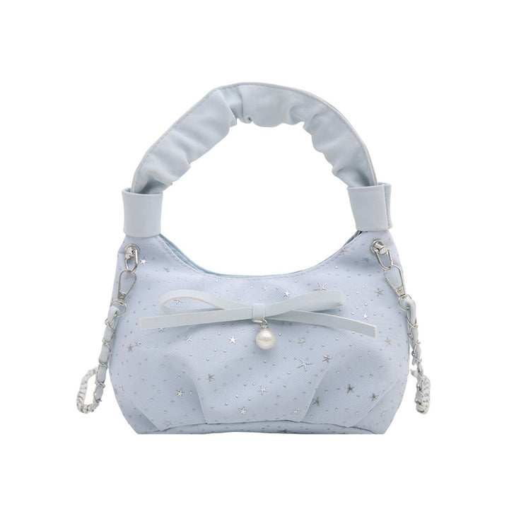 Elegante Handtasche mit Schleifendetail und Sternenprint