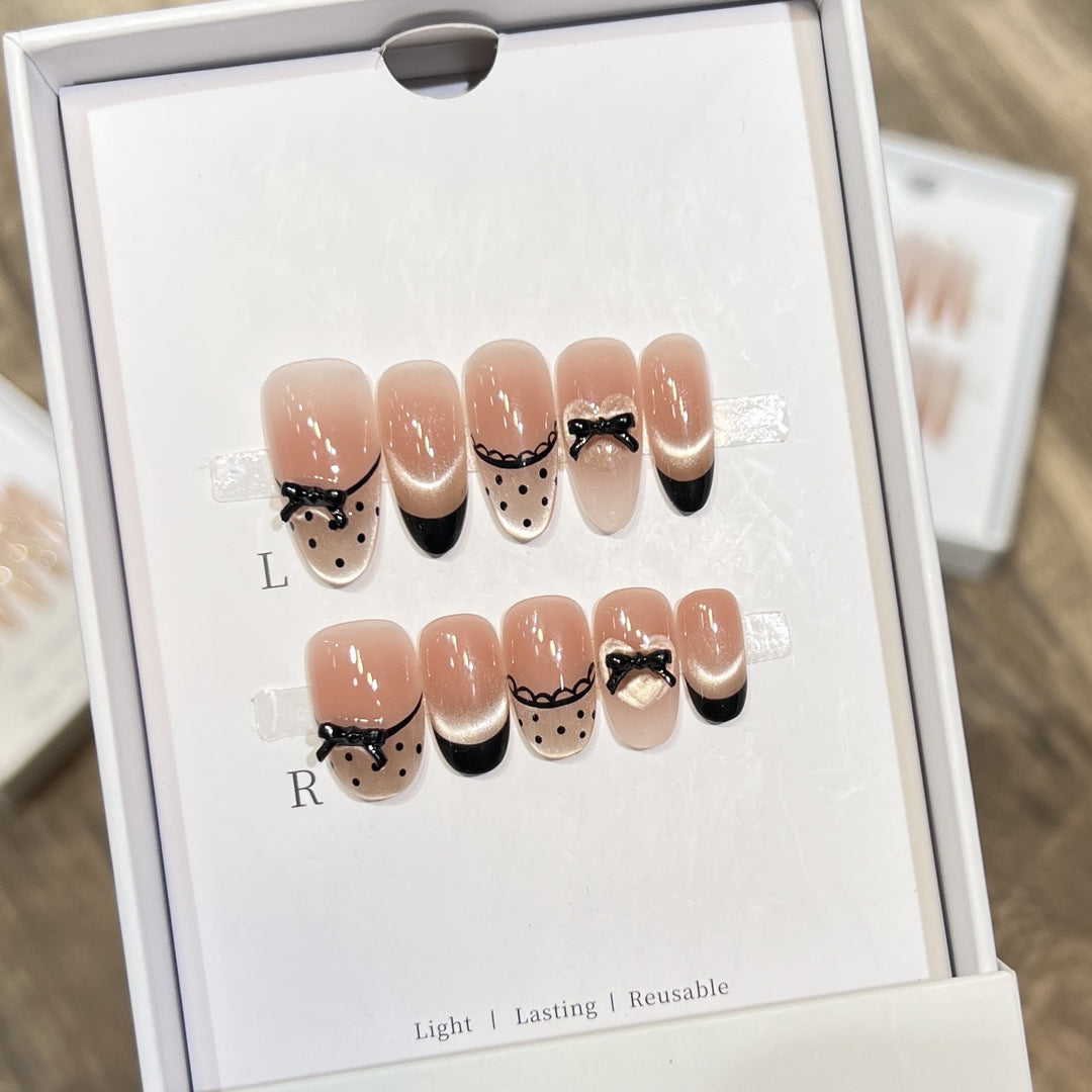 Elegantes wiederverwendbares Press-On-Nail-Art-Set mit charmanten Schleifenakzenten Karnz