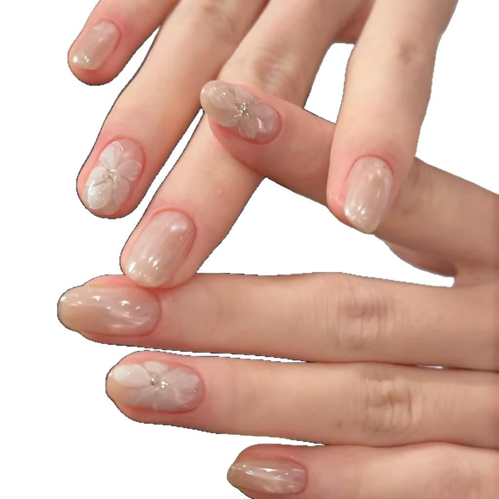 Künstlerische florale Press-On Nagelverzierungen