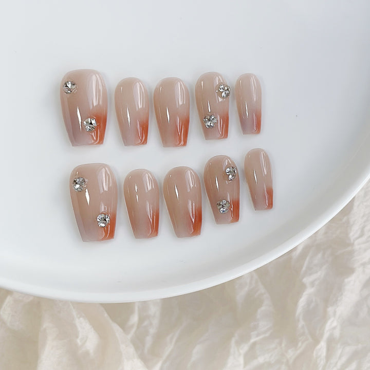 Elegantes Press-On-Nagelkunst-Set mit Strass und Ombre-Design