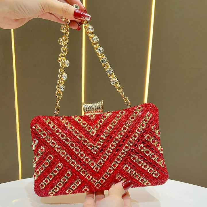Elegante mit Schmucksteinen verzierte Abendhandtasche