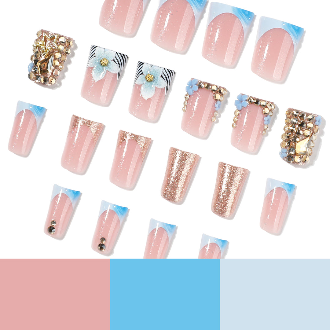 Kunstvolle Nagelverlängerungen mit Floral-Design und Glitzer Karnz