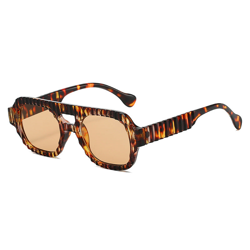 Damen modische Sonnenbrille im futuristischen Design mit strukturiertem Rahmen Karnz