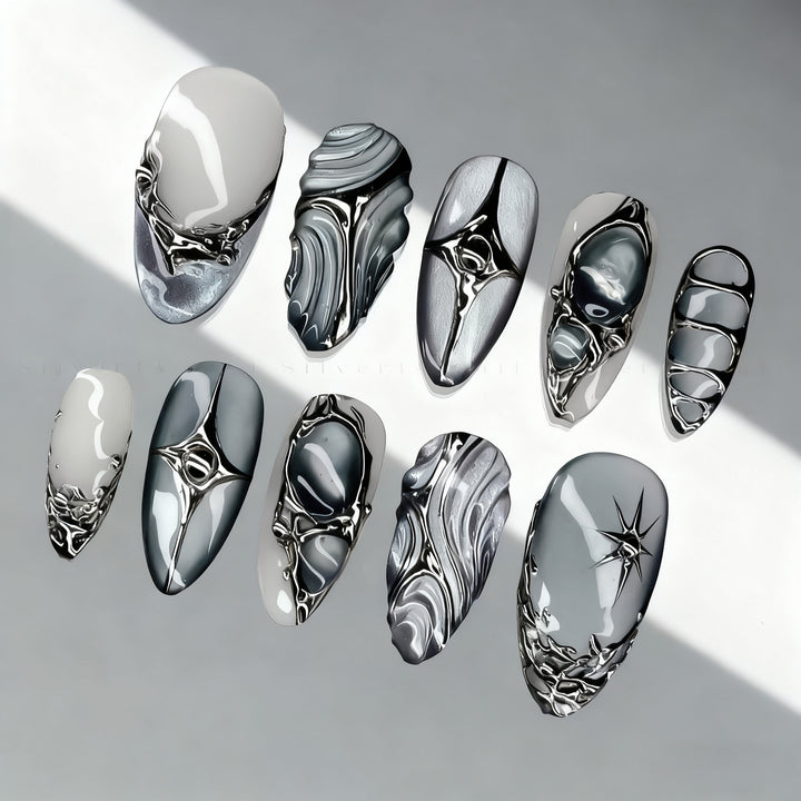 Künstlerisches Drucknagelset mit metallischen Akzenten Karnz