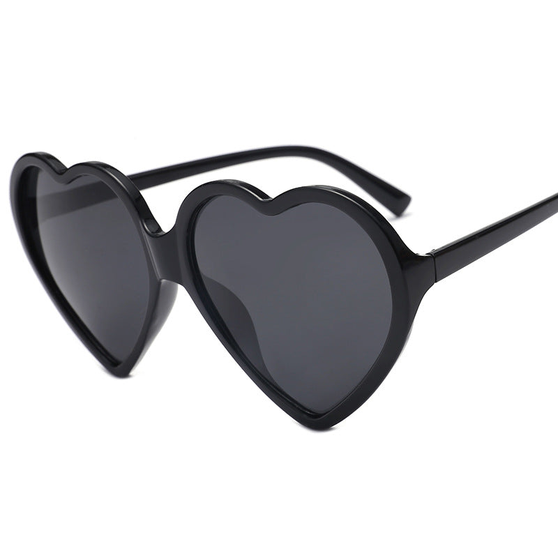 Damen Herzförmige Sonnenbrille mit stylishem Rahmen Karnz