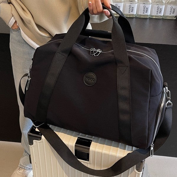 Kompakte Reis-Duffle