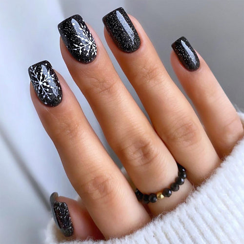 Künstlerisches Press-On Nagelset mit schickem Schneeflocken-Design Karnz