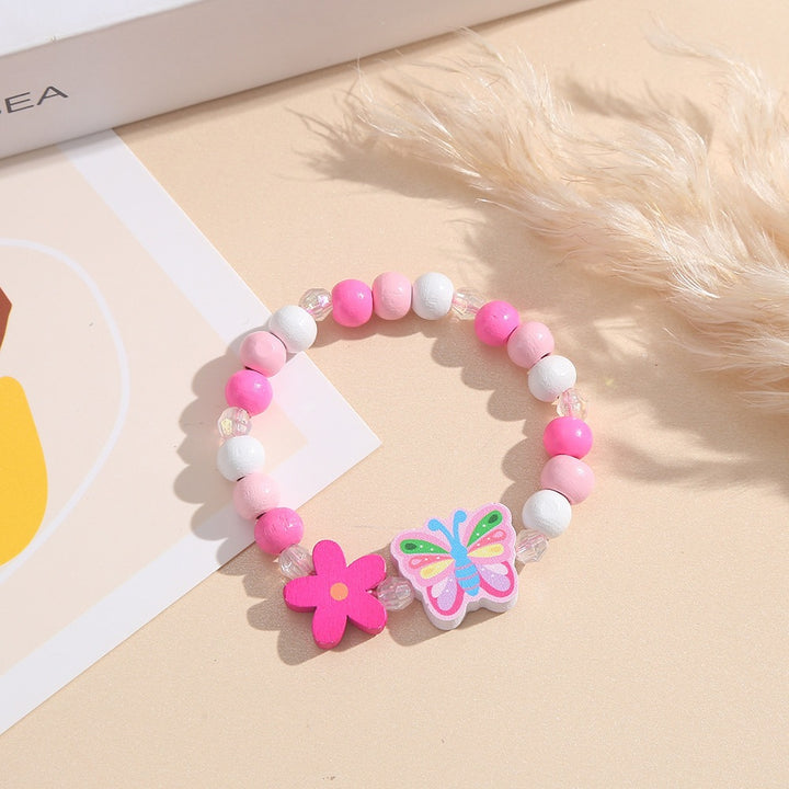 Verspieltes Armband mit Herz- und Schmetterlings-Anhängern Karnz