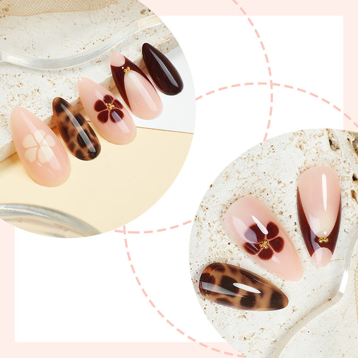 Künstlerisches Press-On-Nagelset mit floralen und tierischen Drucken Karnz