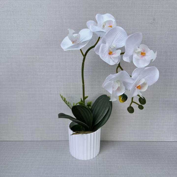 Realistische Kunst-Orchideenpflanzenanordnung