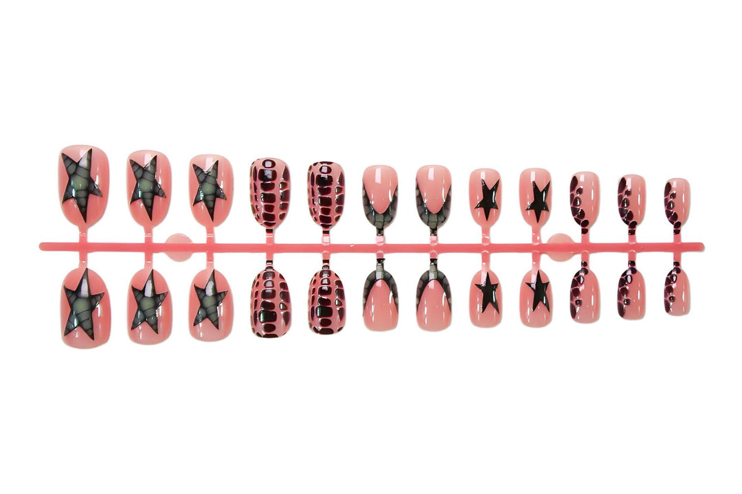 Kunstnagelset mit modernen Stern- und Tiermotiven Karnz