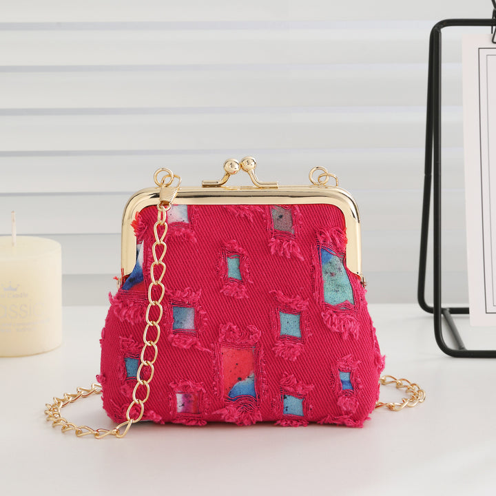 Vintage-inspirierte Stoff-Clutch