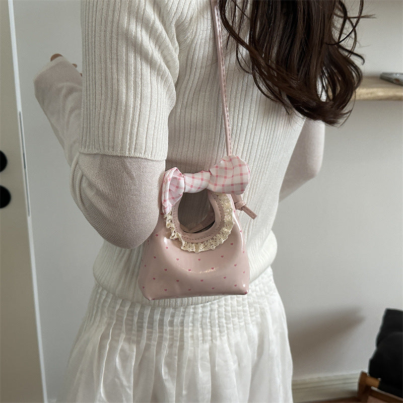 Charmante Mini-Handtasche mit Schleifenakzent