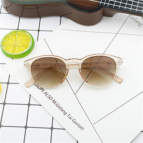 Damen modische runde Sonnenbrille mit elegantem Kunststoffrahmen Karnz
