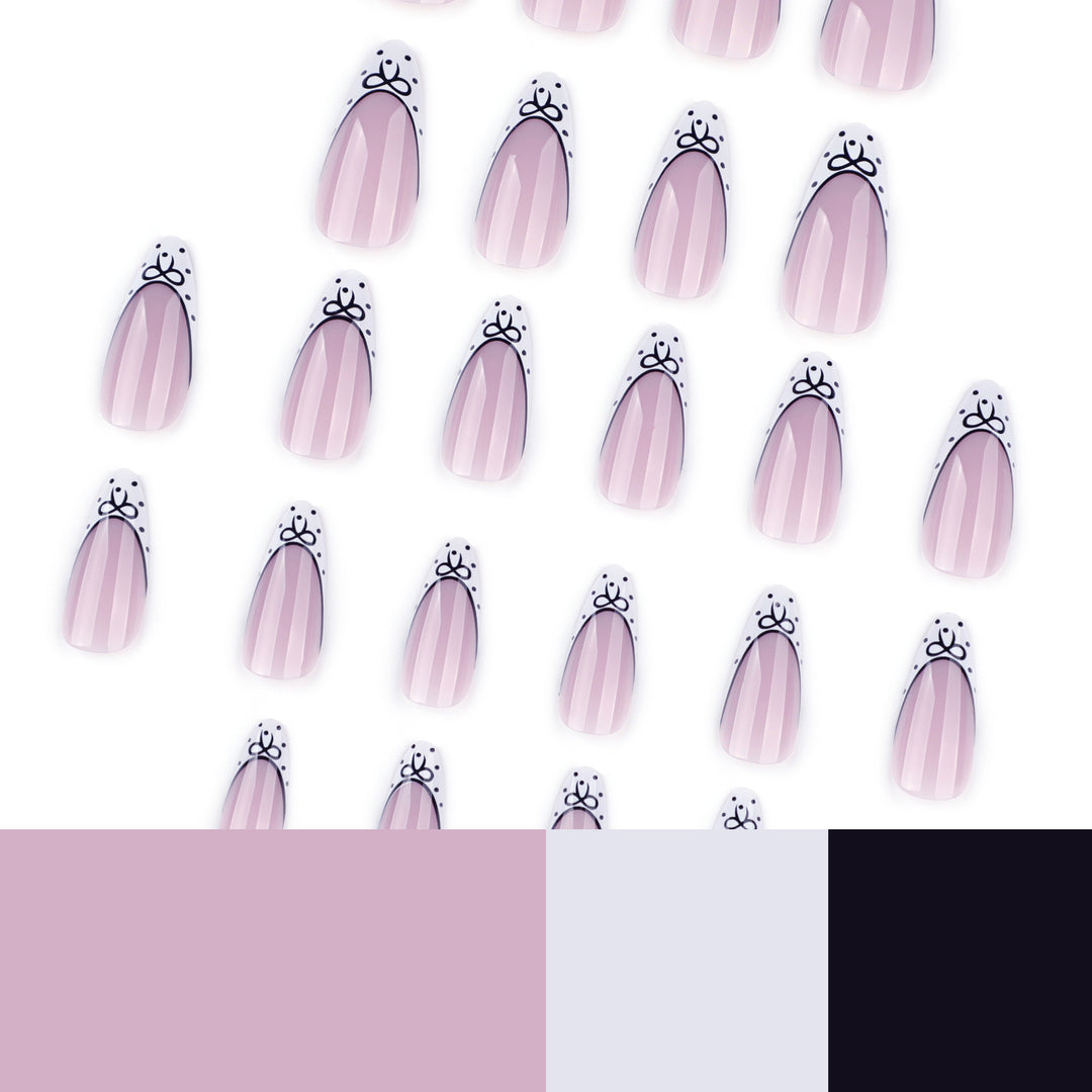 Kunstvolle Stiletto-Nägel mit elegantem Floral Design Karnz