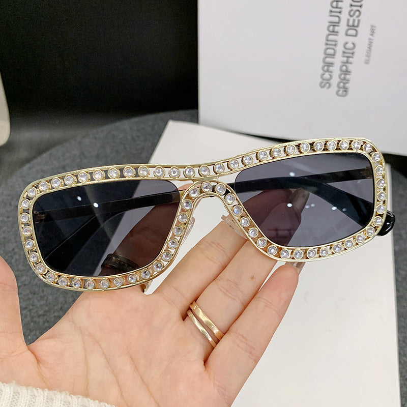 Damen extravagante Cat-Eye Sonnenbrille mit goldenen Akzenten Karnz