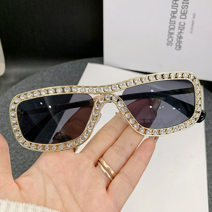 Damen extravagante Cat-Eye Sonnenbrille mit goldenen Akzenten Karnz