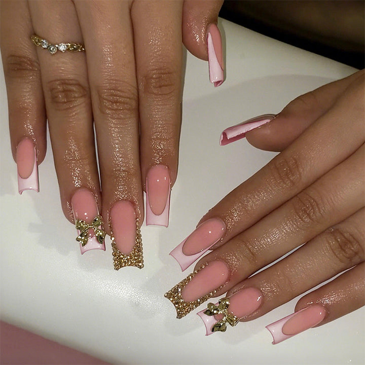 Dekoratives Press-On Nail Art Set mit elegantem Bogen und Edelstein-Akzenten Karnz