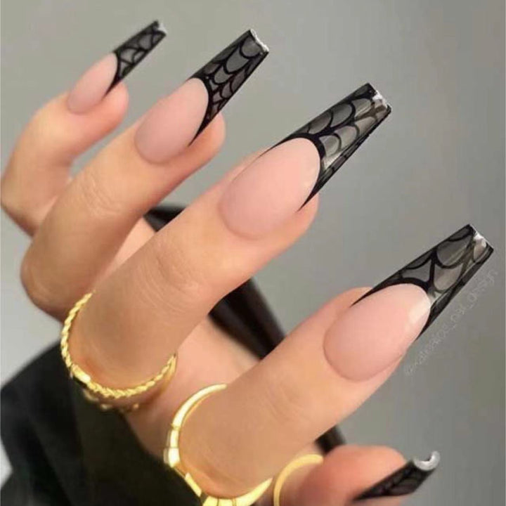 Künstlerische Stiletto Press-On Nägel mit Spinnennetzdesign