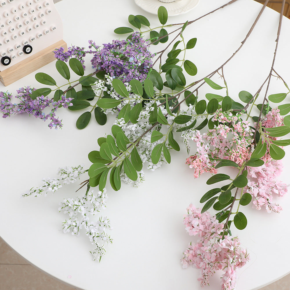 Künstlicher Blütenzweig mit lebendigen lila Blüten Karnz