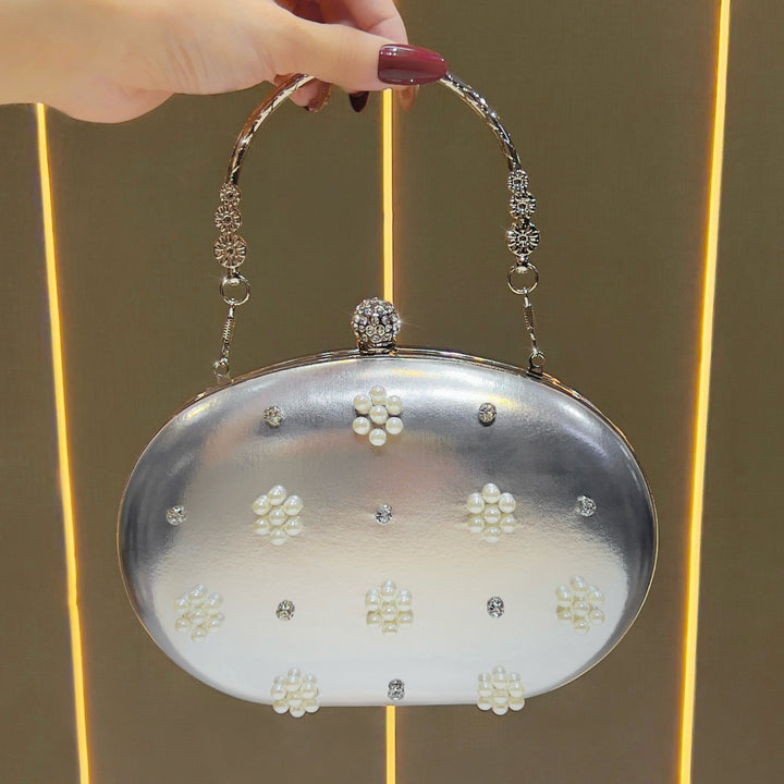 Vintage-inspirierte perlenverzierte Abendclutch