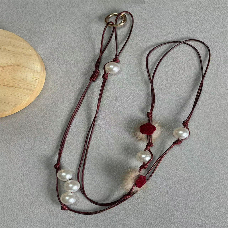 Elegante Perlen Brillenband Karnz