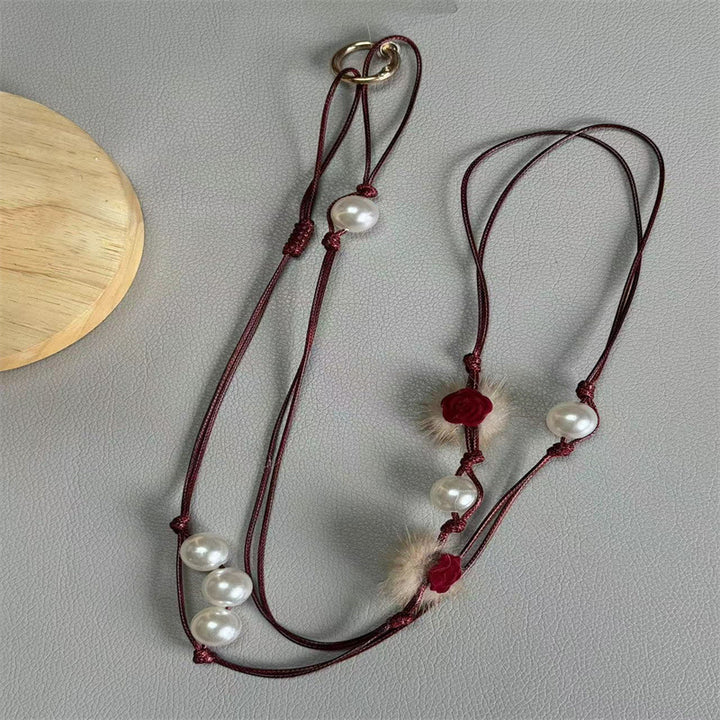 Elegante Perlen Brillenband Karnz
