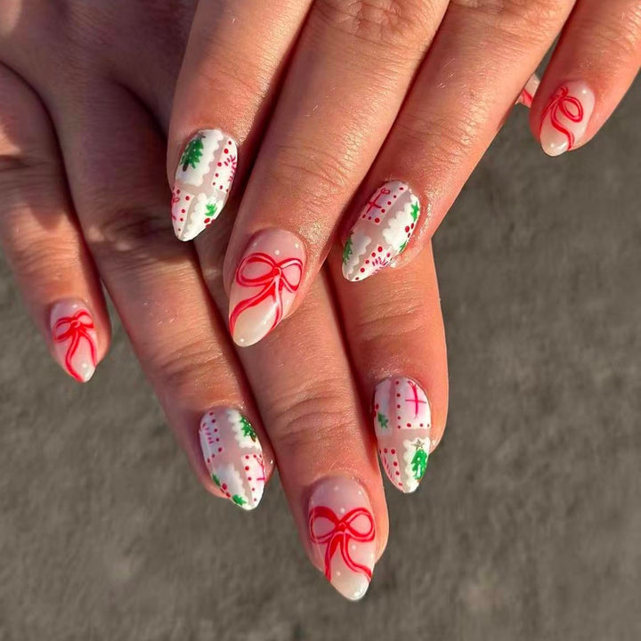 Kunstnagelset mit festlichen Geschenk- und Schleifenmotiven Karnz